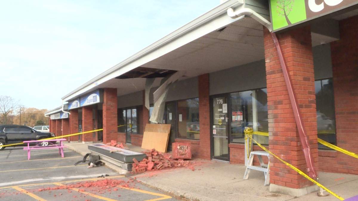 Kingston police are investigating what caused a vehicle to crash into a building early Friday morning. 