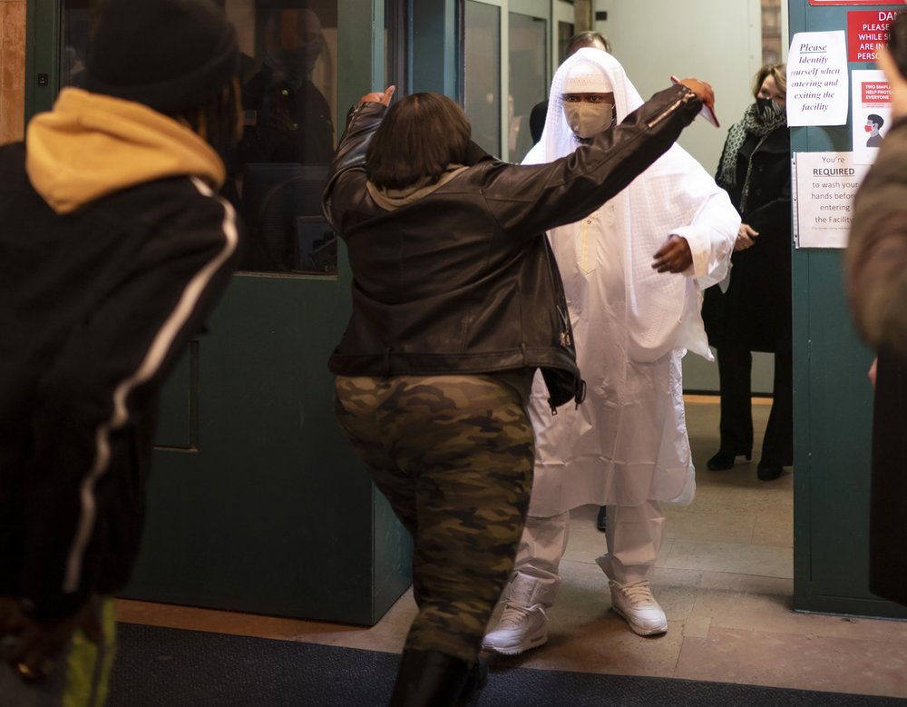 Myon Burrell is greeted after he is released from the Minnesota Correctional Facility in Bayport, Minn., Tuesday, Dec. 15, 2020.