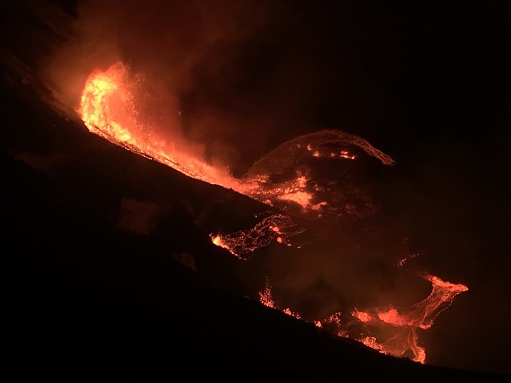 In this photo provided by the U.S. Geological Survey, lava flows within the Halema’uma’u crater of the Kilauea volcano Sunday, Dec. 20, 2020.