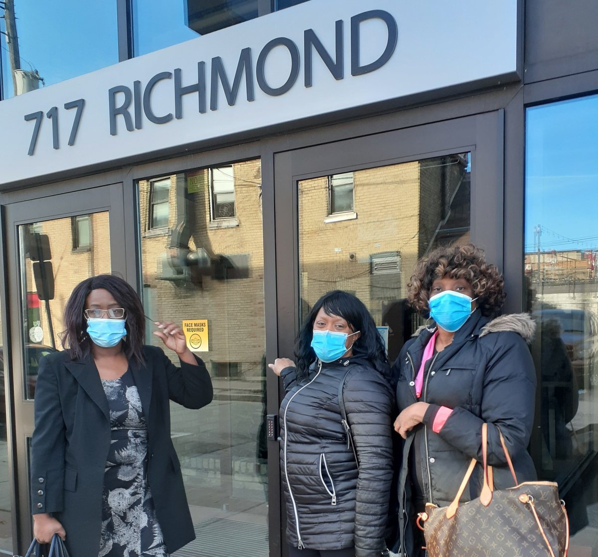 Pastor Sandie Thomas, Wendy Davis, and Pastor Charmaine Campbell-Heath outside of the centre's current home on Richmond Street.