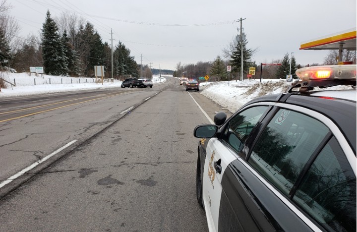 According to police, a white SUV was exiting from private lot that houses several businesses when it was hit by a black pickup truck travelling west on Airport Road.