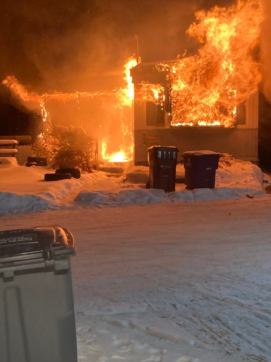 Saskatoon firefighters said they arrived to find a mobile home in Sutherland engulfed in flames.