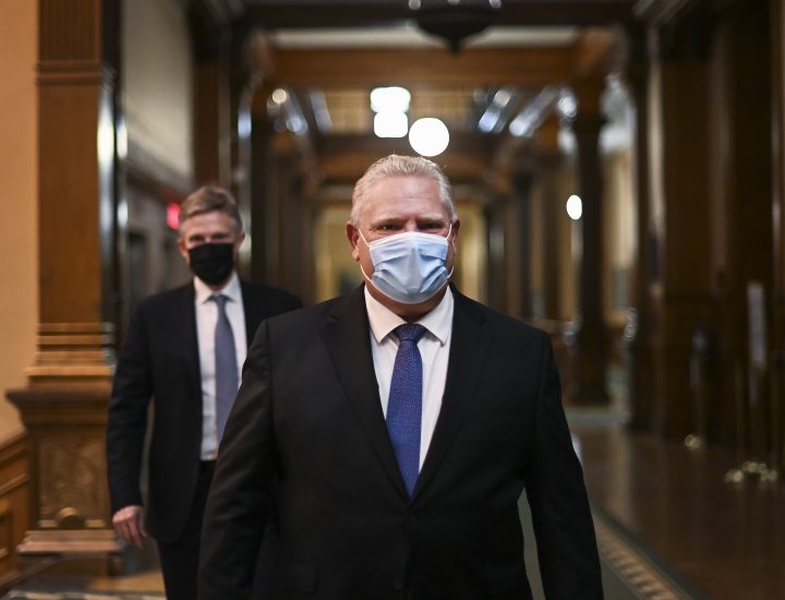 Ontario Premier Doug Ford Ontario walks to his press conference during the COVID-19 pandemic in Toronto, Friday, November 20, 2020.