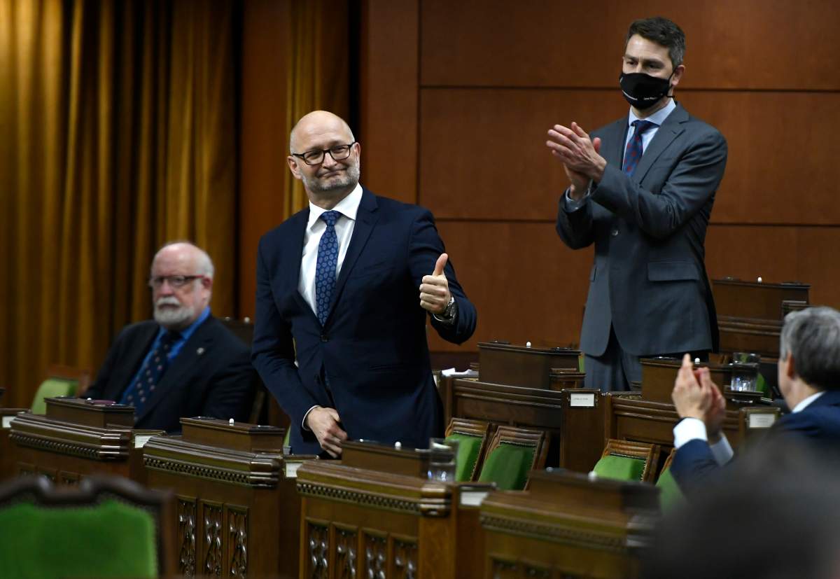 Minister of Justice David Lametti gives a thumbs up as he rises to vote in favour of a motion on Bill C-7, medical assistance in dying, in the House of Commons on Parliament Hill in Ottawa, on Thursday, Dec. 10, 2020. 