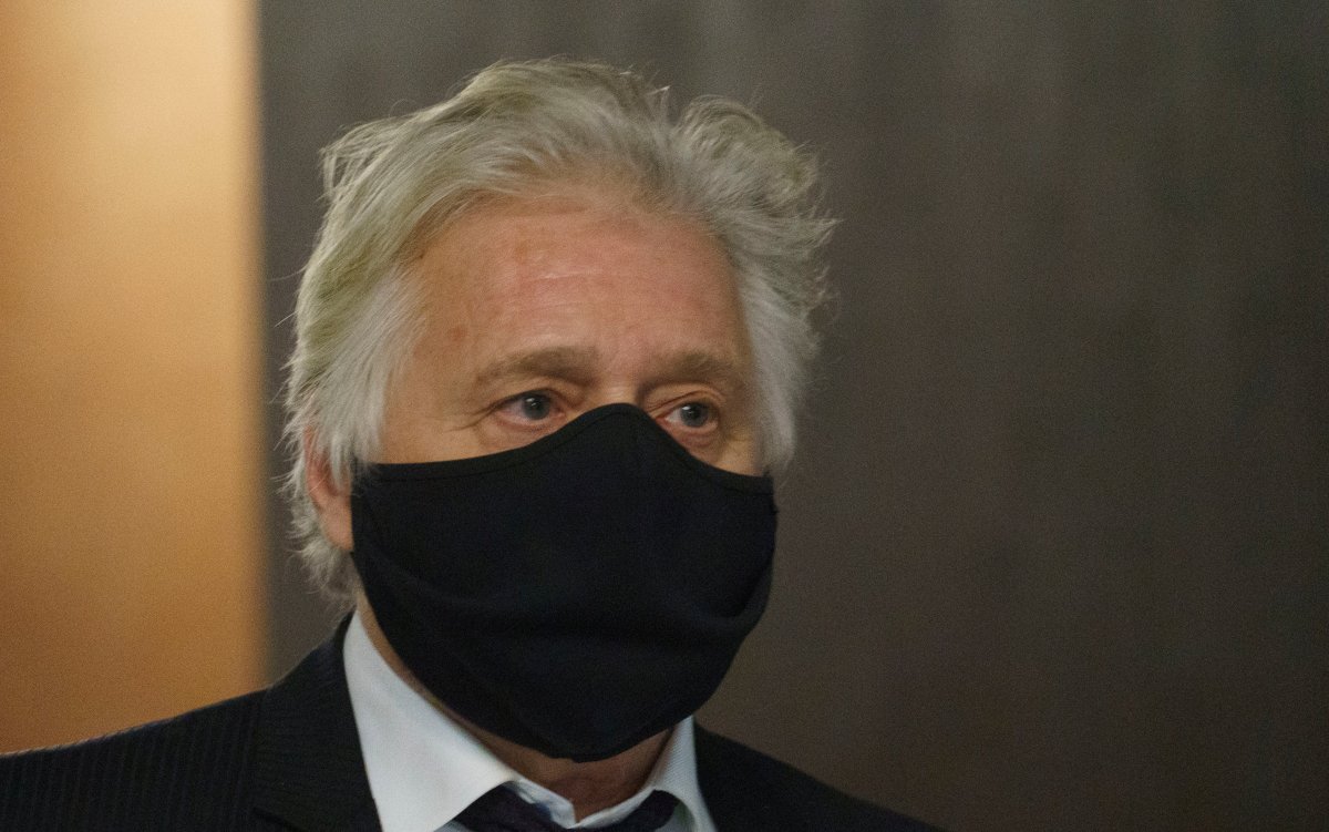 Just for Laughs founder Gilbert Rozon walks the hallways of the courthouse waiting for the verdict on his sexual assault trial in Montreal on Tuesday, December 15, 2020. 