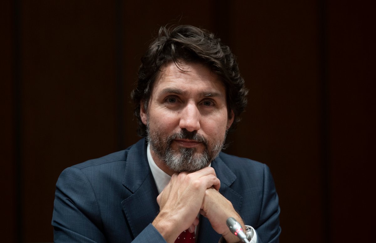 Prime Minister Justin Trudeau listens to a question during a year end interview with The Canadian Press in Ottawa, Wednesday, December 16, 2020.