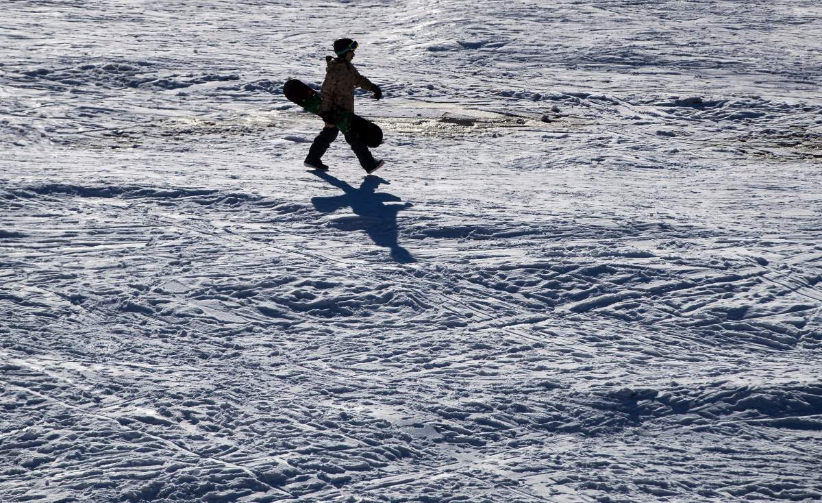 A California man on his way to snowboard at Whistler was issued a fine under the Quarantine Act. 