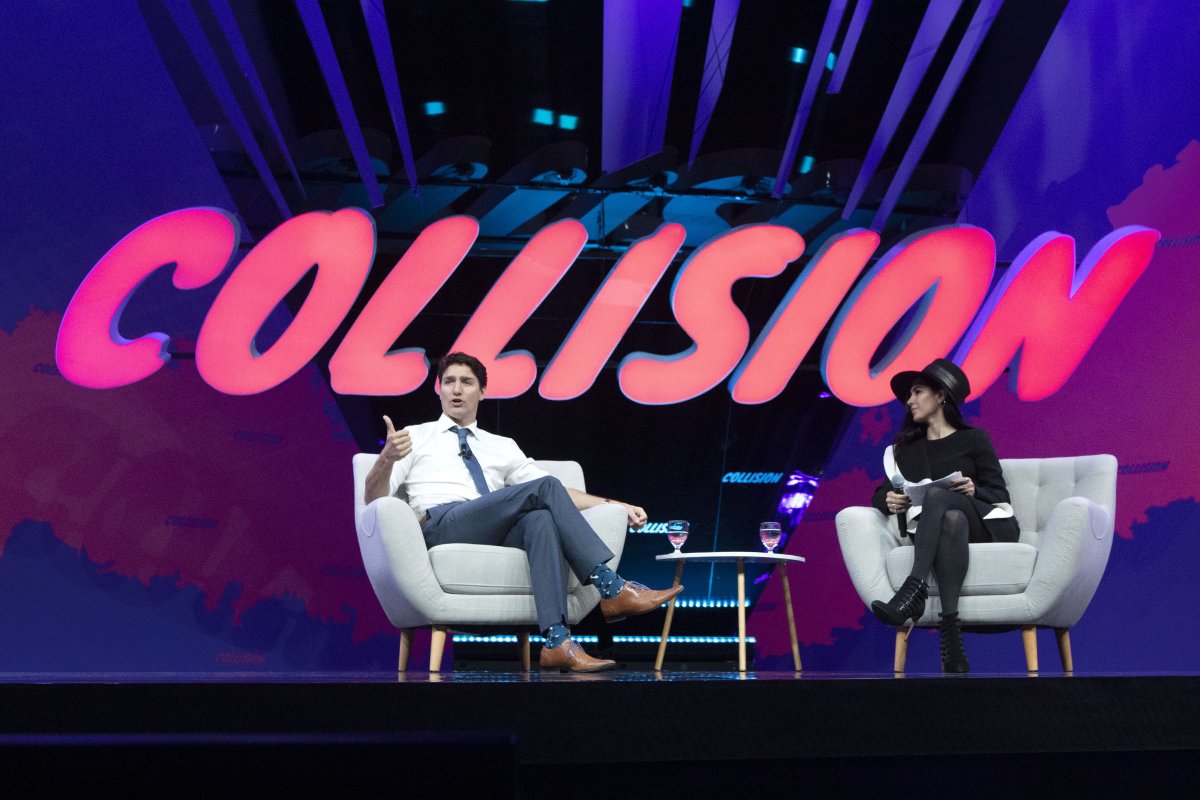 File photo - Prime Minister Justin Trudeau participates in an armchair discussion with founder and CEO of BroadbandTV Corp, Shahrfad Rafaiti, at the Collision tech conference in Toronto on Monday May 20, 2019.