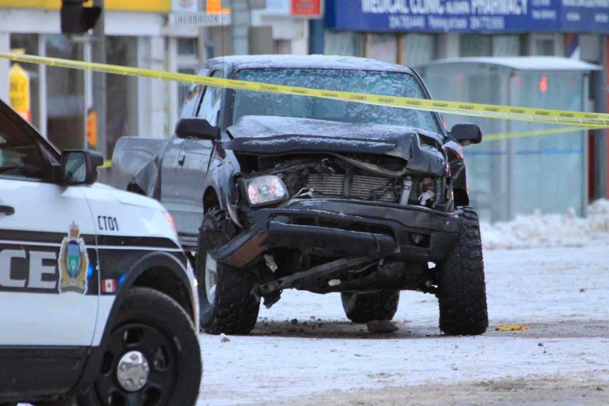 One of two damaged pick-up trucks sitting on Portage Ave. Sunday morning following an overnight collision.