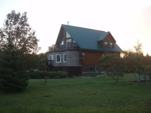 Photo of Brenda and George Forbes’ home in Portapique, N.S. This home was later owned by Joanne Thomas and John Zahl, two of the victims of the gunman’s killing spree. The gunman burned it on April 18.