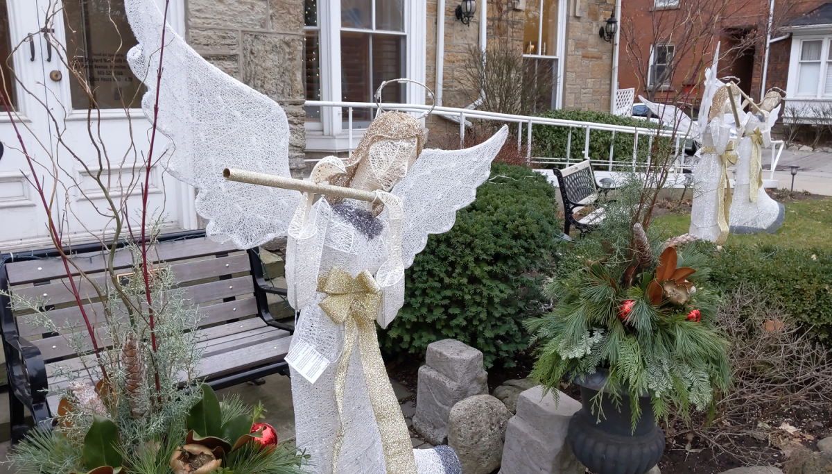 The angel statues in front of Emmanuel House stand 5'2" tall and come in three pieces, which would make them "cumbersome" to remove, according to the facility's director.