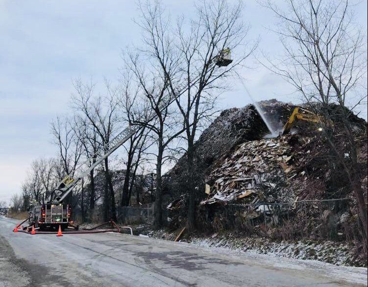 Debris at a Laval recycling plant catches fire on Saturday Dec. 26, 2020.