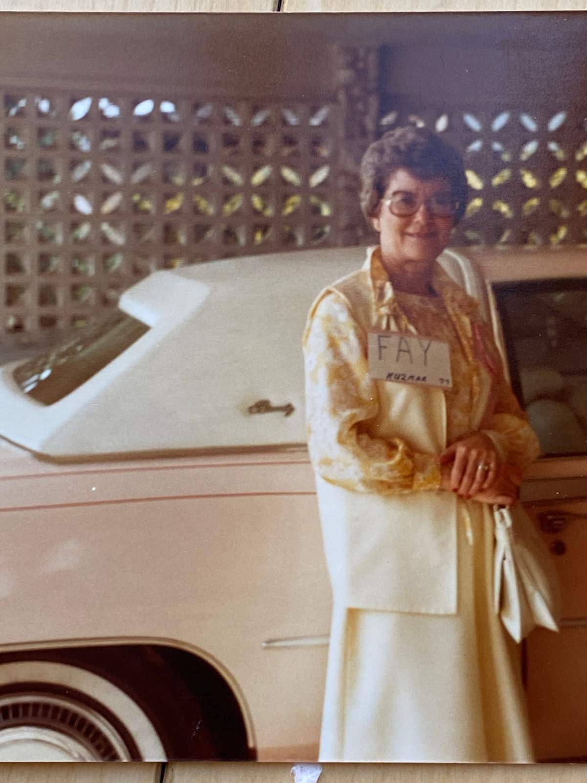Fay Kuzmar and her pink Buick Regal.