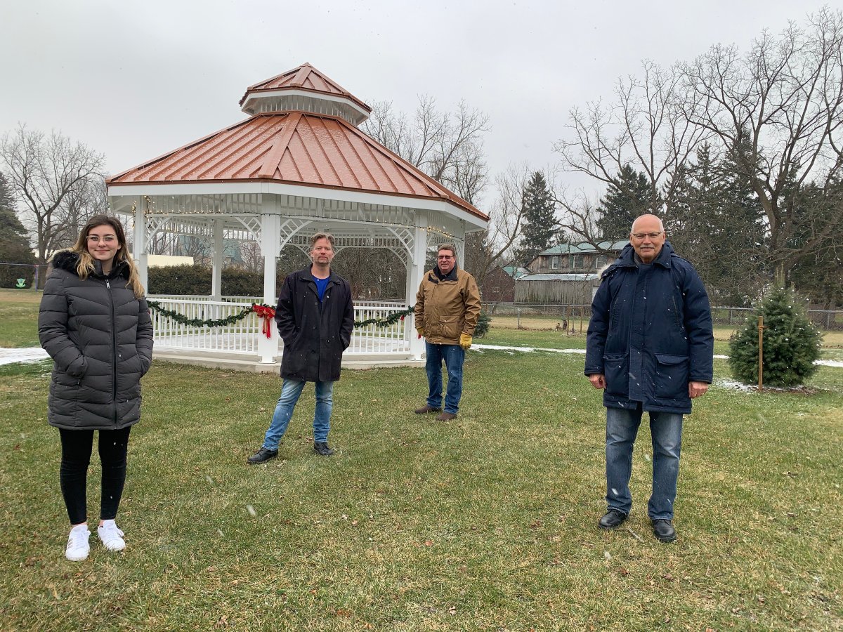 Emily Stage and Andrew Gunn of Andrew Gunn Consulting and young & free press joined
Southwold Township History Committee members Len Lynch and Ross Burgar to celebrate a
donation of $8,500 from the Estate of Donna Bushell in support of the Fingal Heritage Park.