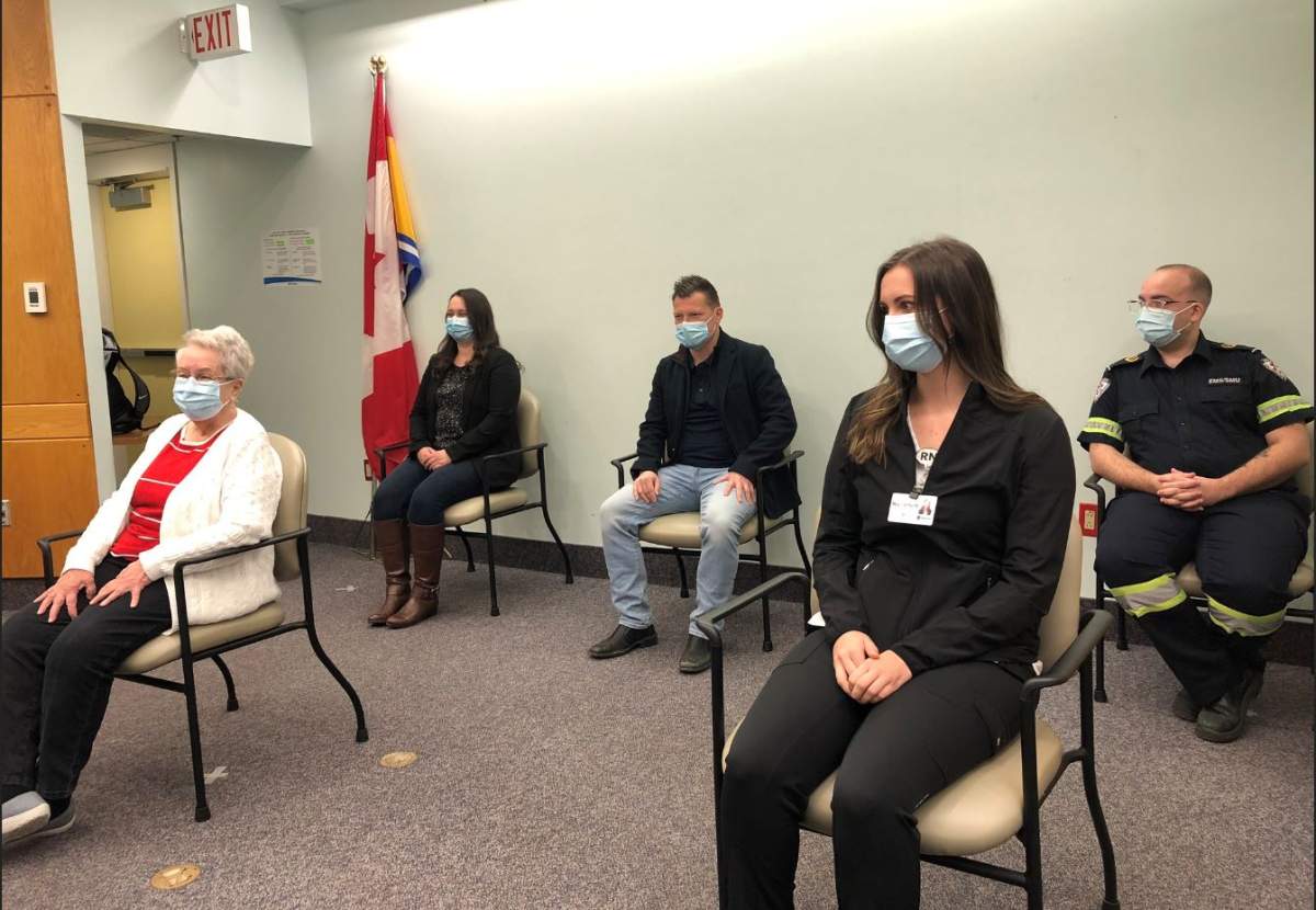 A long-term care resident and four health-care workers were the first New Brunswickers to be vaccinated for the coronavirus on Dec. 19.