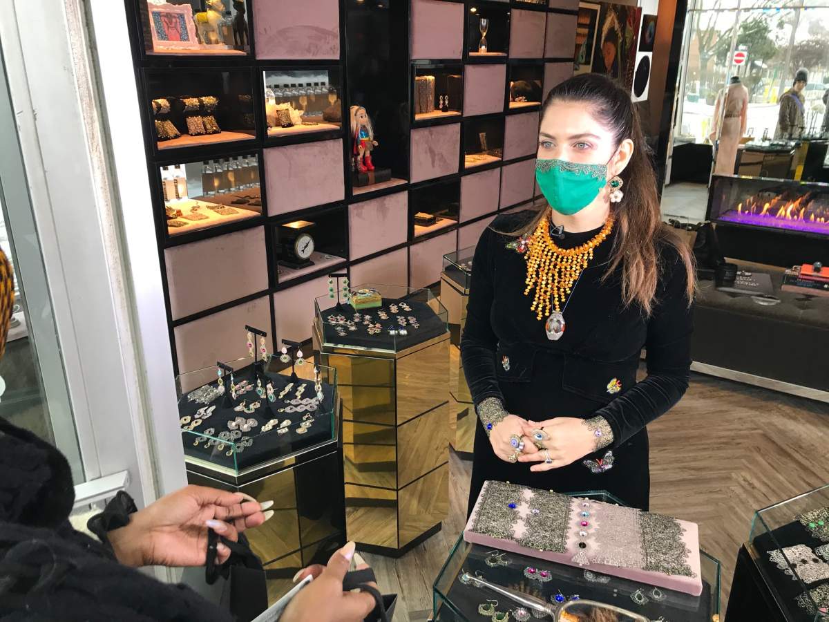 Kim Smiley serves a customer as part of her personalized window shopping experience.