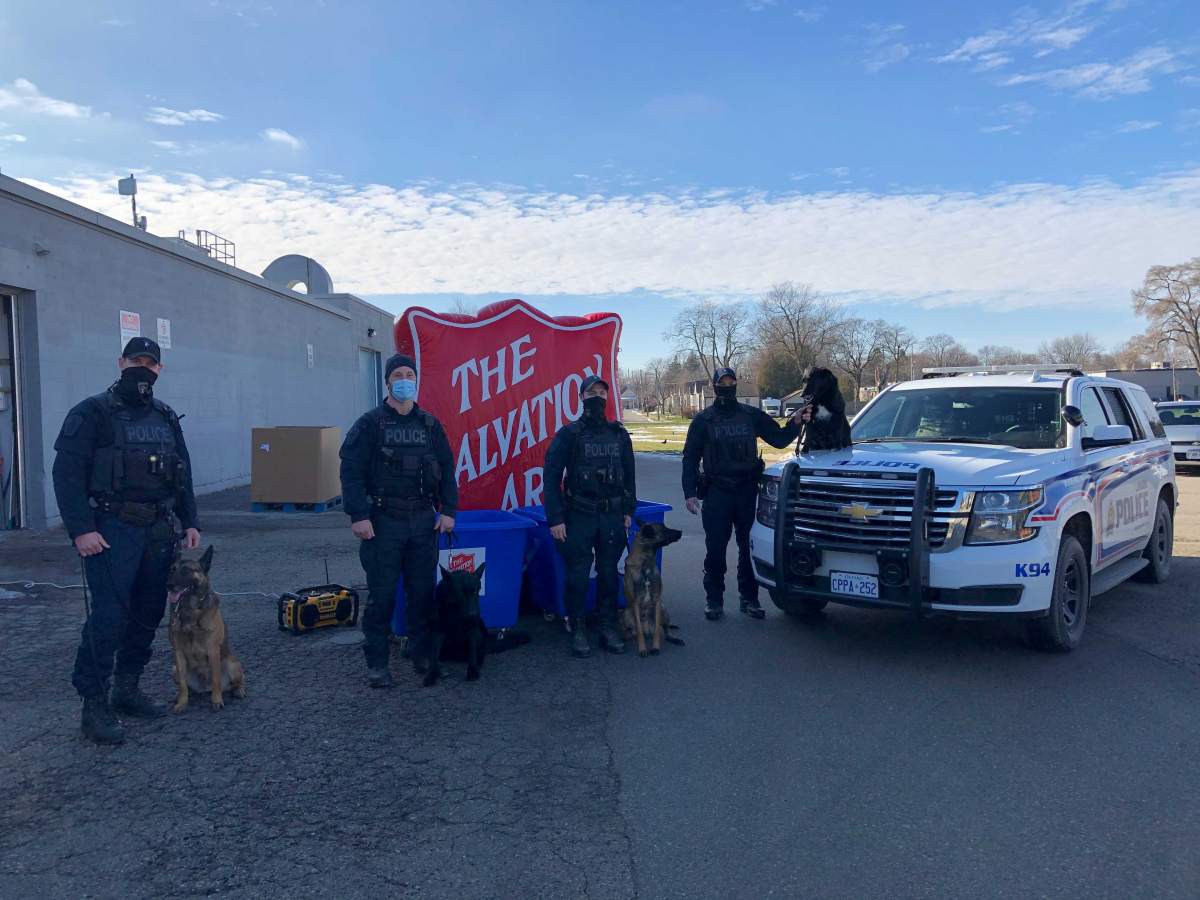 Members of the London Police Service’s Canine Unit stop by Silverwood Arena to drop off donations for Thursday’s toy drive.