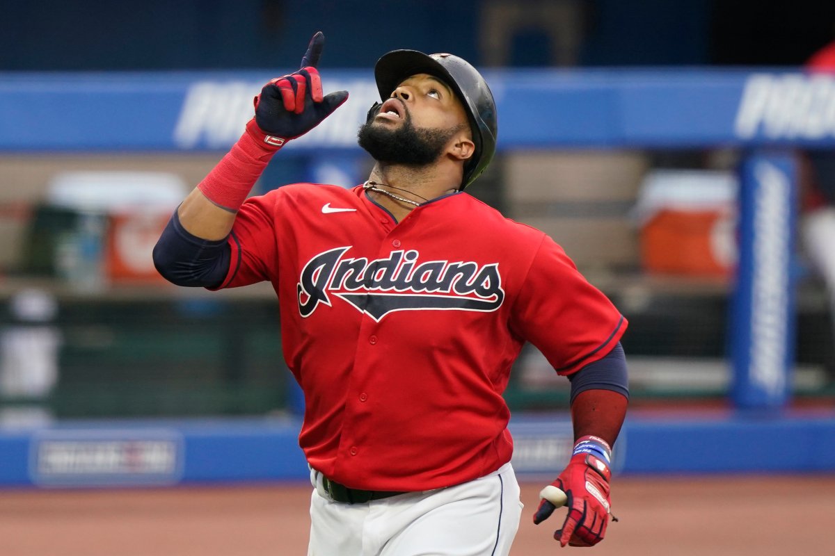Cleveland Indians' Carlos Santana looks up after hitting a solo home run in the second inning of a baseball game against the Chicago White Sox, Wednesday, Sept. 23, 2020, in Cleveland.
