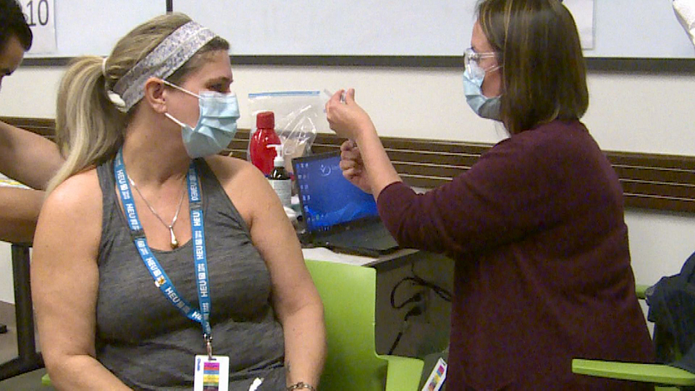 The Interior Health Authority administered its first coronavirus vaccination on Tuesday, Dec. 22, 2020. A health-care aide from Kelowna was the first to receive the vaccine.