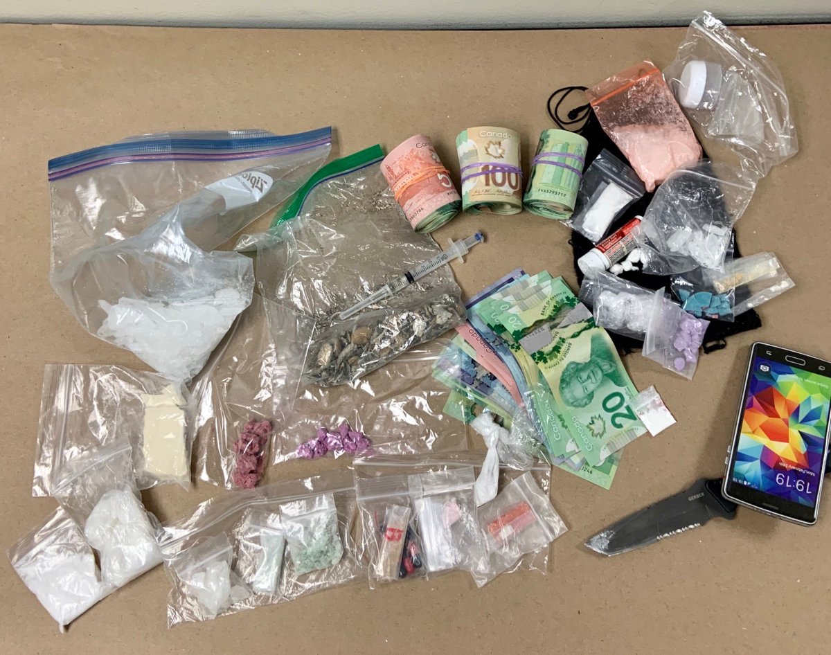 Lethbridge police seized drugs, cash and a weapon from the home of a man arrested for suspected drug trafficking. 