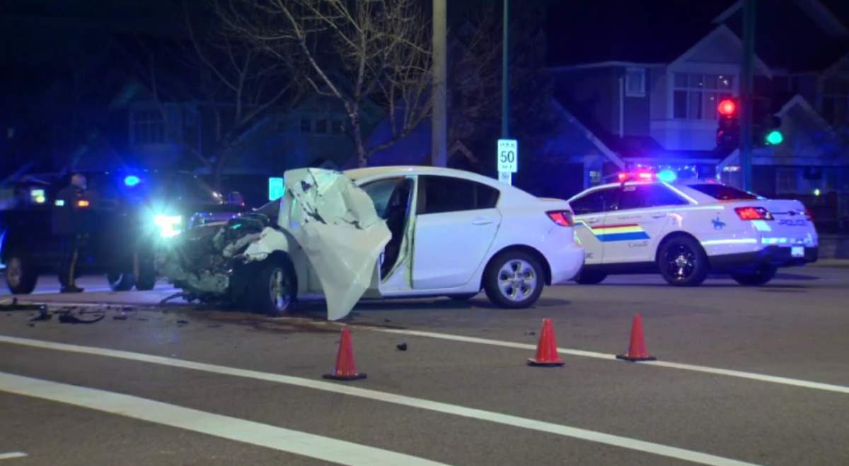 A civilian vehicle shown here was heavily damaged after colliding with an RCMP vehicle Monday night in the Clayton Heights neighbourhood.