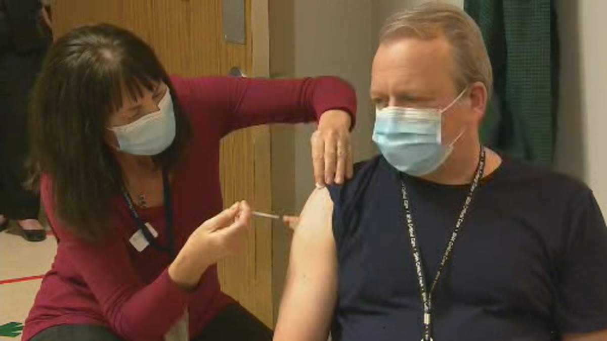 Dr. Jeffrey Betcher was the first person in Saskatchewan to be vaccinated.