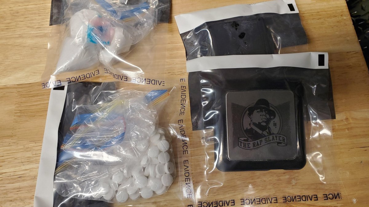 RCMP say cocaine and illicit pills were found when officers raided a Thompson home Tuesday.