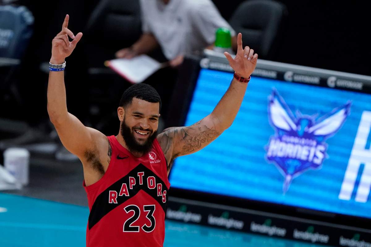 Toronto Raptors guard Fred VanVleet celebrates after scoringing against the Charlotte Hornets during the first half of an NBA preseason basketball game in Charlotte, Monday, Dec. 14, 2020.