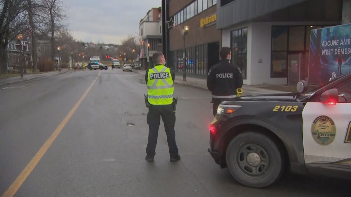 Police in Saguenay have put up a safety perimetre encompassing a large section of Racine Street after a suspicious package was discovered Friday afternoon near a building housing Ubisoft offices. Dec. 4, 2020.