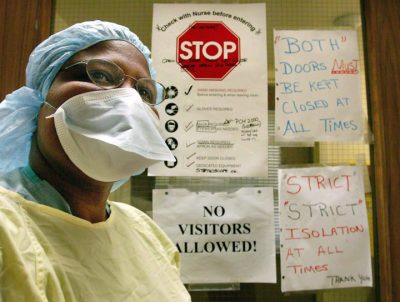 A nurse is shown wearing protective clothing at Sunnybrook Hospital in Toronto on March 17, 2003. 