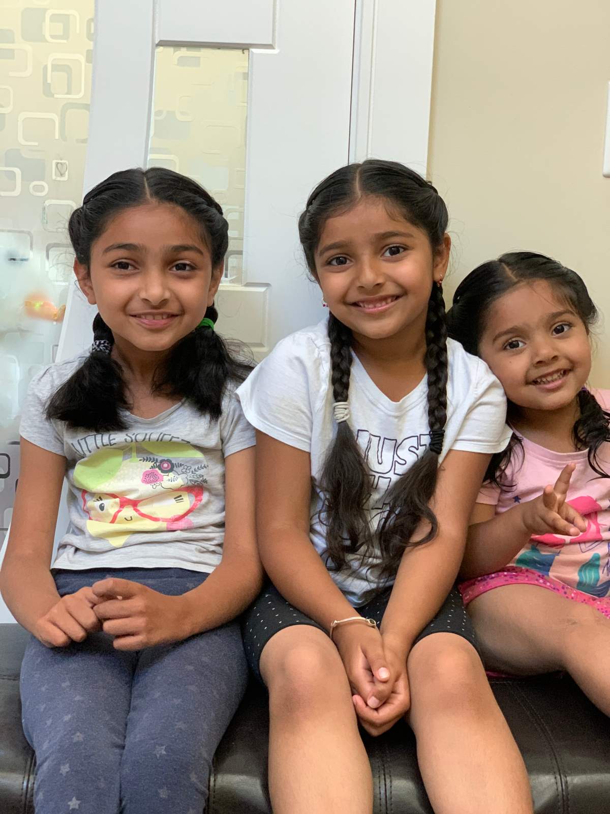 Amber Athwal, 8, with her sisters, Anahat and Avrose.