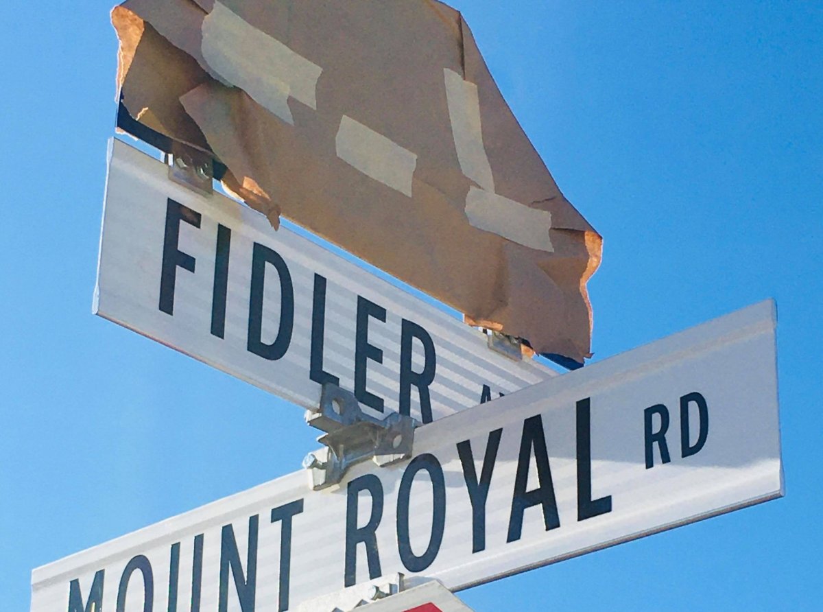 The sign at Fidler Avenue and Mount Royal Road prior to its unveiling Friday.