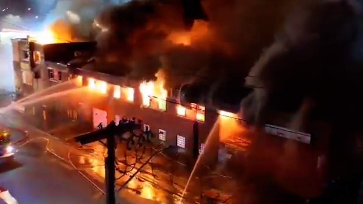 Vacant building fully involved in flames at Bath Rd. & Princess St., Kingston