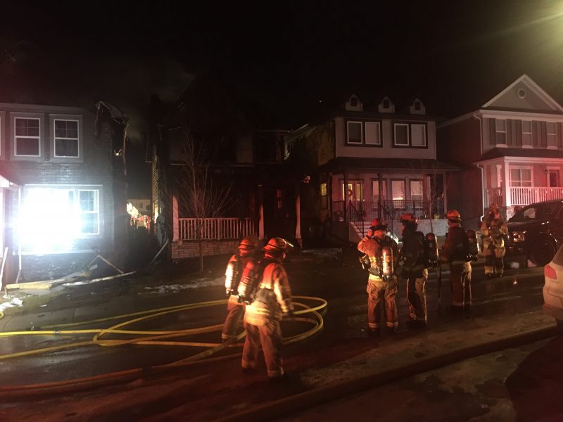 Calgary firefighters battle a blaze in Nolan Hill on Thursday, Dec. 3, 2020.