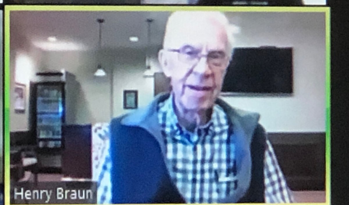 Henry Braun listens to 90th birthday messages via Zoom on Thursday from the students of the Regina school named after him.  