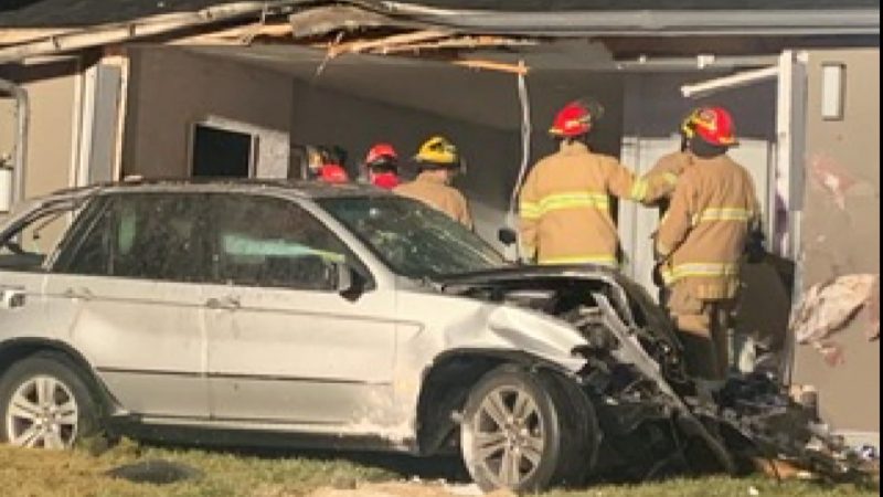 Emergency crews investigate after a vehicle crash into a home at 2055 33 Street Southeast. 