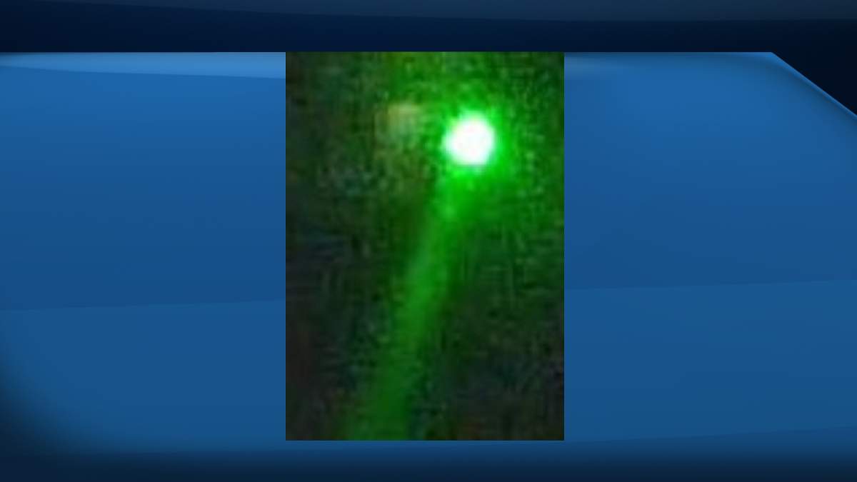 What the Air 1 pilots first noticed from the ground when the laser was initially pointed at the chopper.