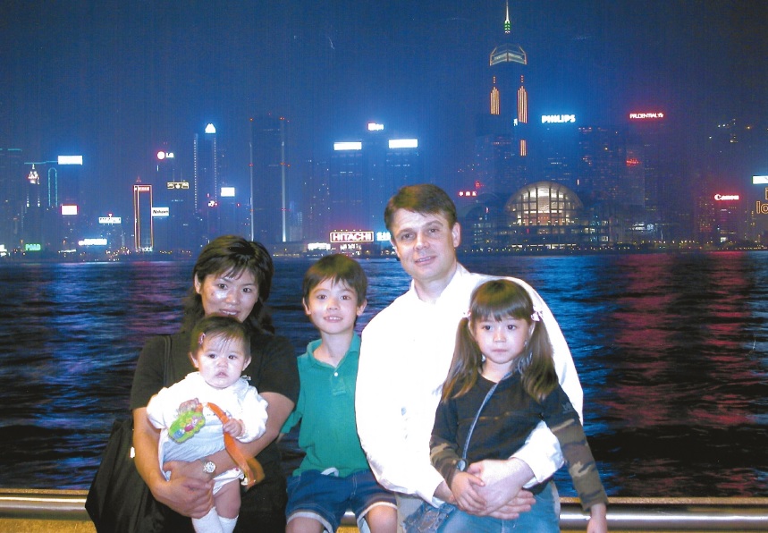 William and Mika Munsey with their children in Hong Kong