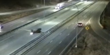 Small plane hits SUV in dramatic video of highway emergency landing