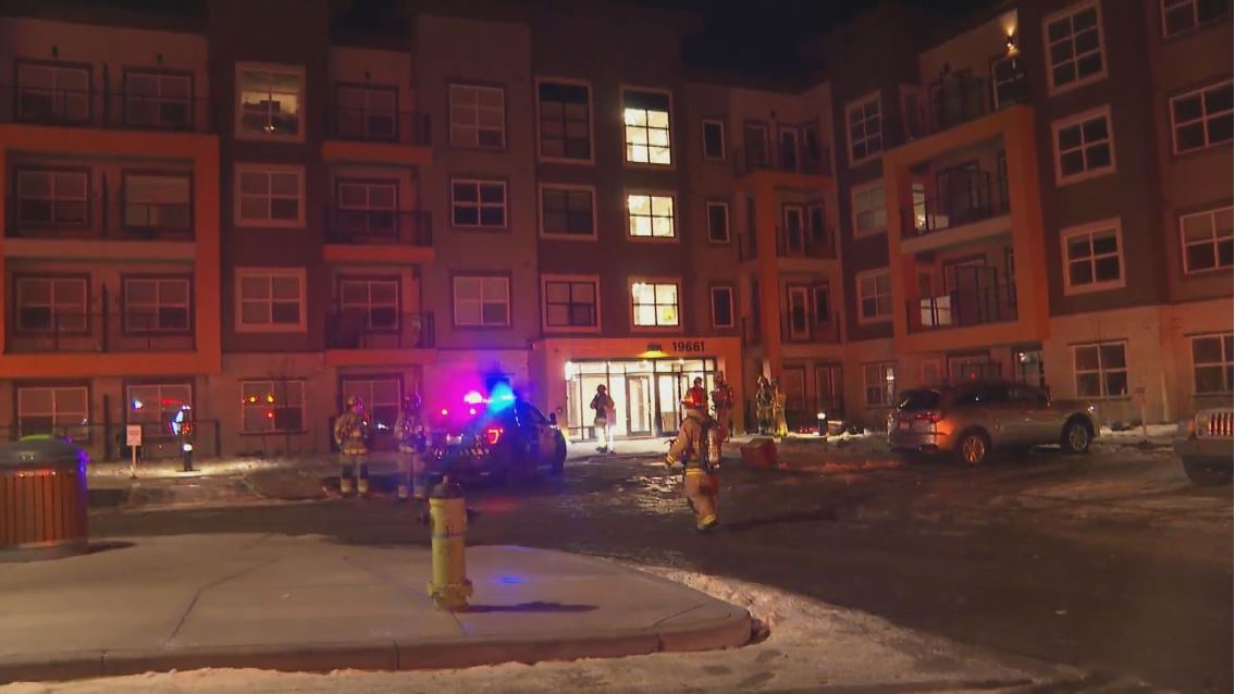 Calgary Fire crews said a small fire was discovered in the parkade, but smoke spreading throughout both buildings prompted the evacuation. 
