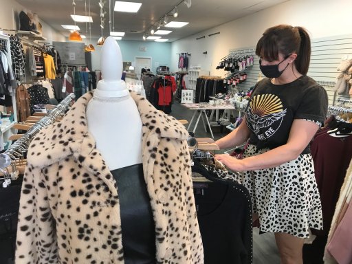 K Lee Boutique owner Kristen Lang says she has got creative in serving customers during the holiday season and through the COVID-19 pandemic, Monday, Dec. 28, 2020.