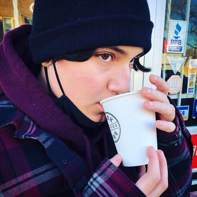 Sarah Brooker's son Travis, 15, takes a sip of the Warrior Hot Chocolate. Proceeds of the beverage's sales are going to help make a dream come true for the teenager as he undergoes a series of surgeries.
