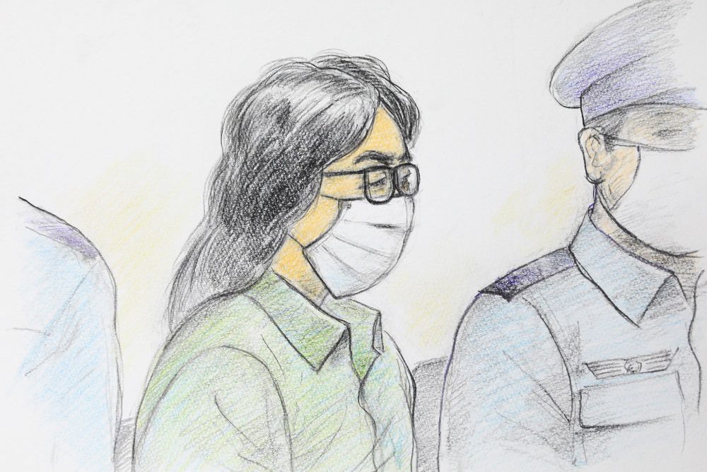 This court sketch drawing created by Masato Yamashita on September 30, 2020 shows Takahiro Shiraishi, centre, at the first trial at Tokyo District Court Tachikawa Branch in Tachikawa, Tokyo. 