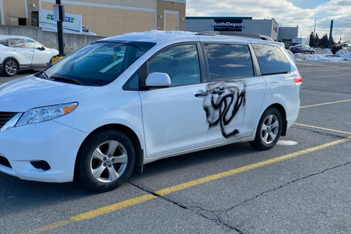Holiday shoppers found their cars tagged with black spray paint in Cambridge and Kitchener on Monday.