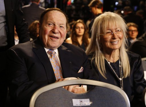 In this Sept. 26, 2016 file photo, Chief Executive of Las Vegas Sands Corporation Sheldon Adelson sits with his wife Miriam waits for the presidential debate between Democratic presidential nominee Hillary Clinton and Republican presidential nominee Donald Trump at Hofstra University in Hempstead, N.Y.