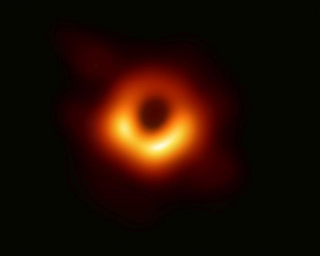 This image provided Wednesday, April 10, 2019, by Event Horizon Telescope, shows a black hole. 