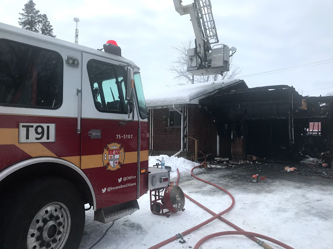 Fire crews contained flames that broke out in a Metcalfe home garage on Friday, Jan. 22, 2021.