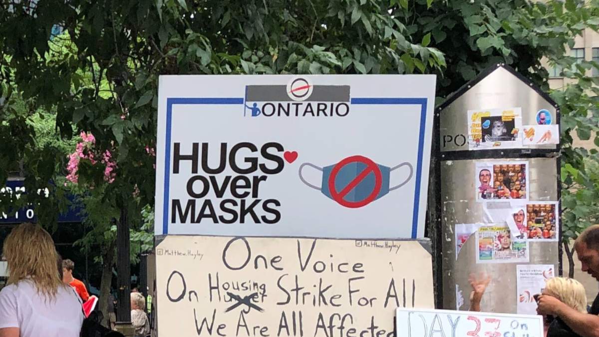 13 ‘Hugs Over Masks’ protestors charged after another demonstration at Hamilton city hall - image