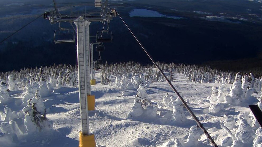 A webcam view from the Gem Lake chairlift at Big White Ski Resort.