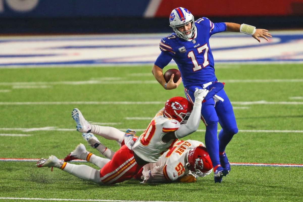 Kansas City Chiefs' Willie Gay (50) and Frank Clark (55) take down Buffalo Bills quarterback Josh Allen (17) during the second half of an NFL football game, Monday, Oct. 19, 2020, in Orchard Park, N.Y. The Chiefs defeated the Bills 26-17.